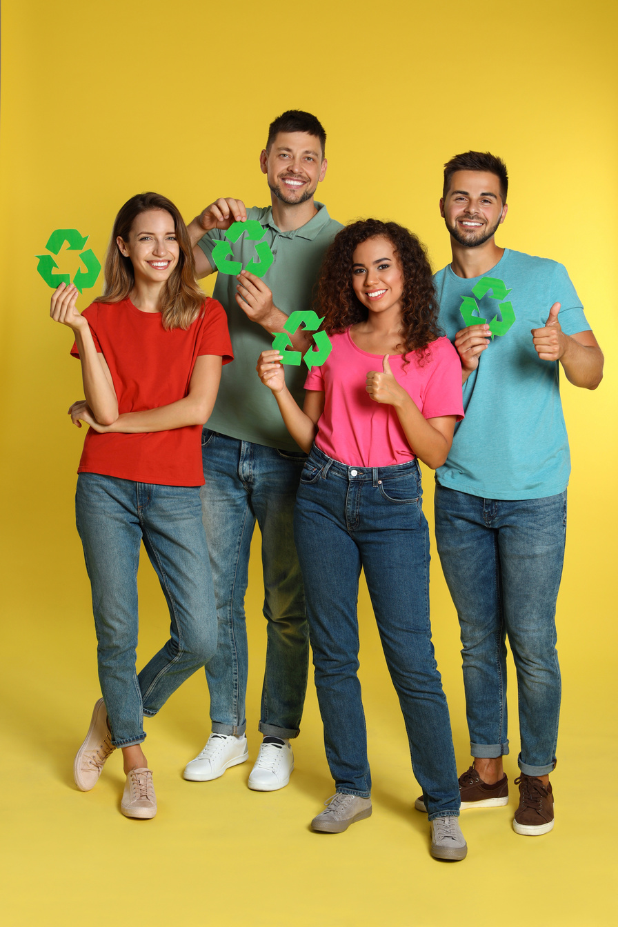 Group of People with Recycling Symbols on Yellow Background